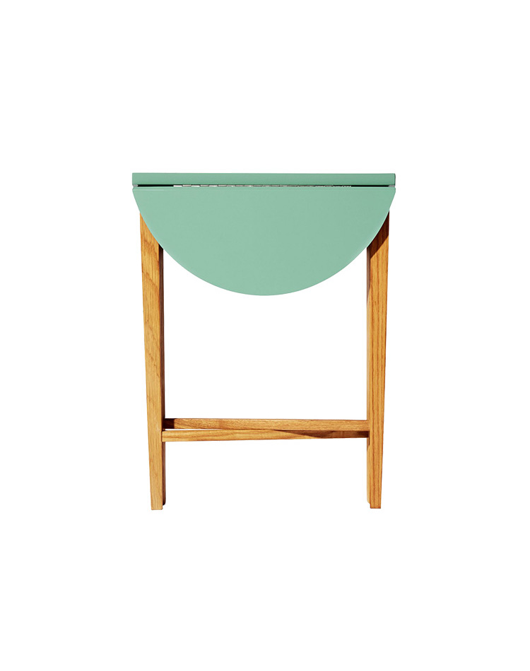 A turquoise night stand with wooden legs
