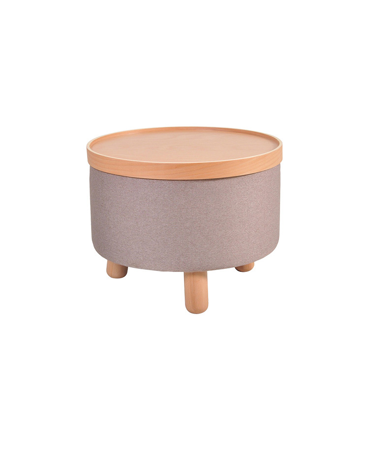 A covered candle with three wooden legs