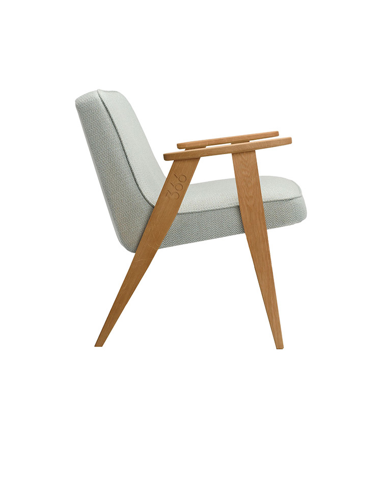 A stylish armchair from a profile view