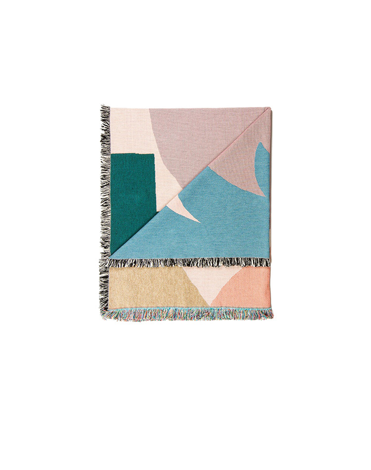 A pastel coloured scarf with geometric designs